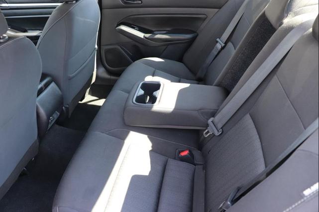 Photo of 2023 Burgundy Nissan Altima