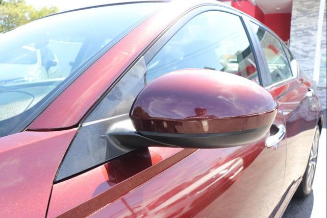 Photo of 2023 Burgundy Nissan Altima
