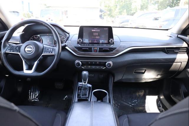 Photo of 2023 Burgundy Nissan Altima