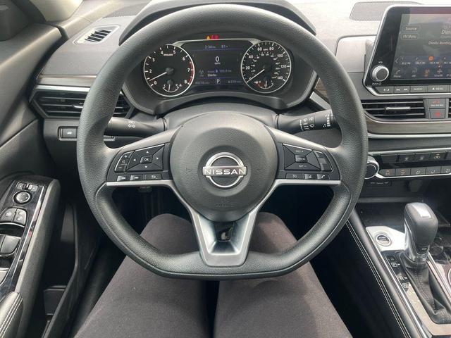Photo of 2023 Pearl White Tri-Coat Nissan Altima