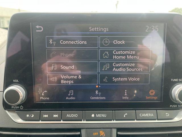 Photo of 2023 Pearl White Tri-Coat Nissan Altima