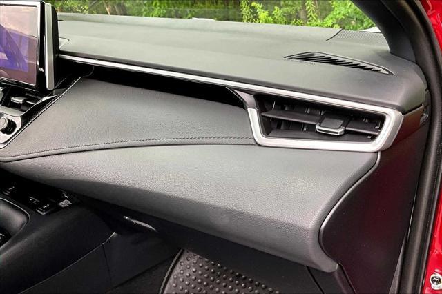 Photo of 2024 Ruby Flare Pearl/Midnight Black Metallic Toyota Corolla