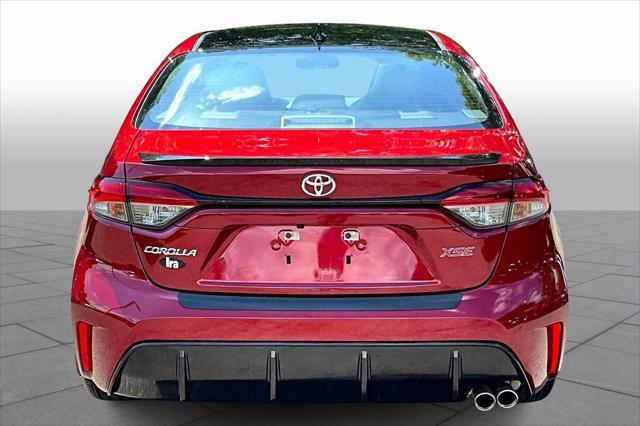 Photo of 2024 Ruby Flare Pearl/Midnight Black Metallic Toyota Corolla