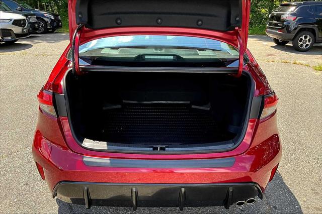 Photo of 2024 Ruby Flare Pearl/Midnight Black Metallic Toyota Corolla