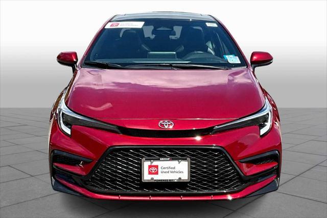 Photo of 2024 Ruby Flare Pearl/Midnight Black Metallic Toyota Corolla