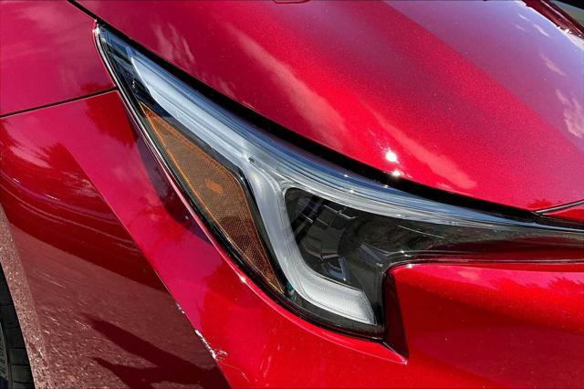 Photo of 2024 Ruby Flare Pearl/Midnight Black Metallic Toyota Corolla