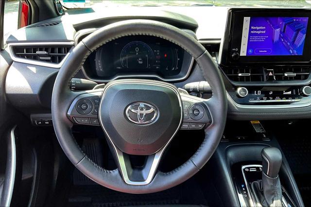 Photo of 2024 Ruby Flare Pearl/Midnight Black Metallic Toyota Corolla