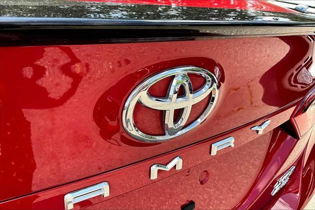 Photo of 2024 Supersonic Red/Midnight Black Metallic Toyota Camry