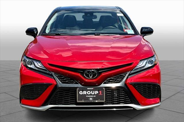 Photo of 2024 Supersonic Red/Midnight Black Metallic Toyota Camry