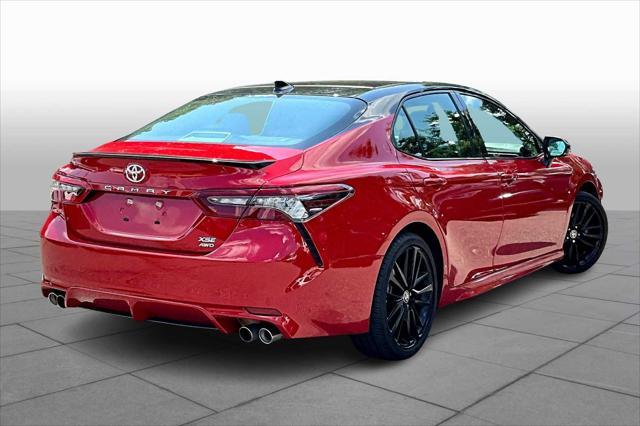 Photo of 2024 Supersonic Red/Midnight Black Metallic Toyota Camry
