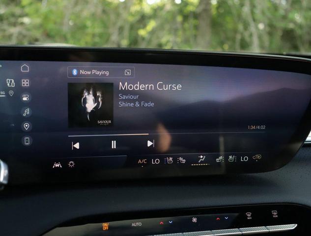Photo of 2026 ocean blue metallic Buick Enclave
