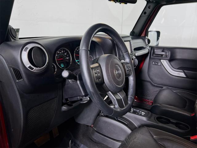 Photo of 2013 Deep Cherry Red Crystal Pearlcoat Jeep Wrangler Unlimited