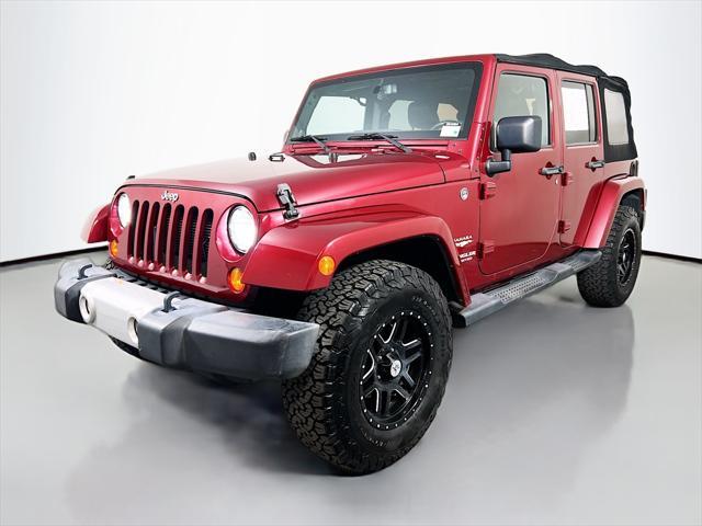 Photo of 2013 Deep Cherry Red Crystal Pearlcoat Jeep Wrangler Unlimited