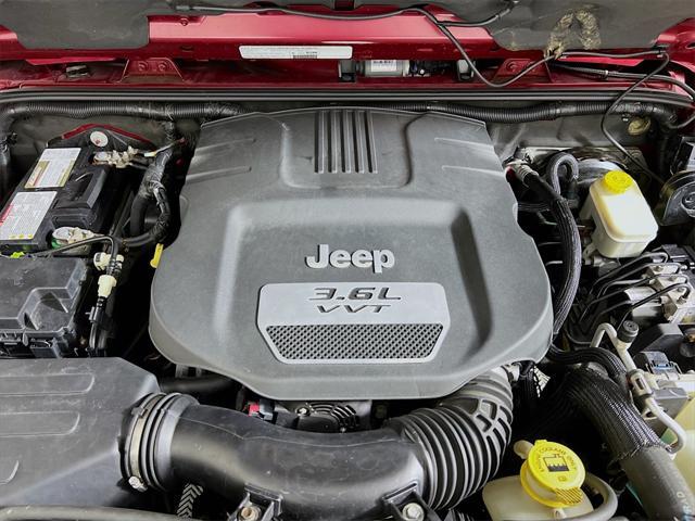 Photo of 2013 Deep Cherry Red Crystal Pearlcoat Jeep Wrangler Unlimited