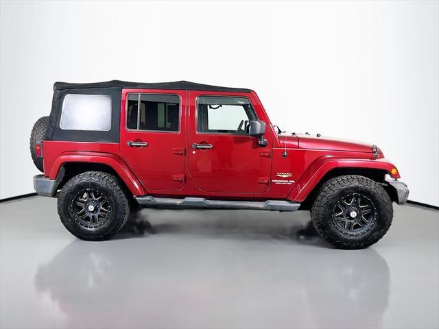 Photo of 2013 Deep Cherry Red Crystal Pearlcoat Jeep Wrangler Unlimited