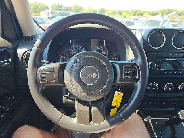 Photo of 2014 Deep Cherry Red Crystal Pearlcoat Jeep Patriot