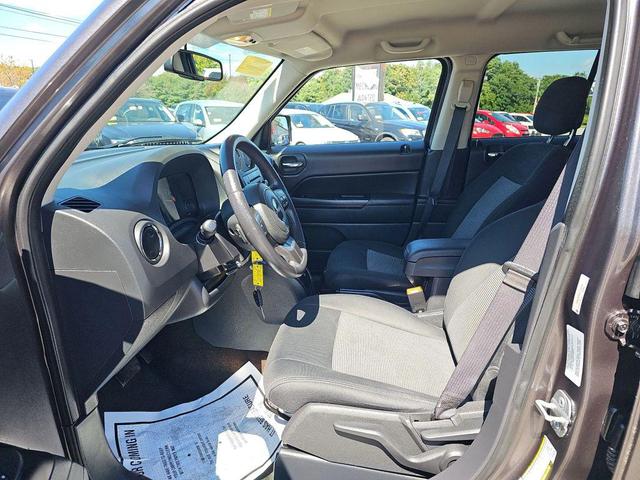 Photo of 2014 Deep Cherry Red Crystal Pearlcoat Jeep Patriot