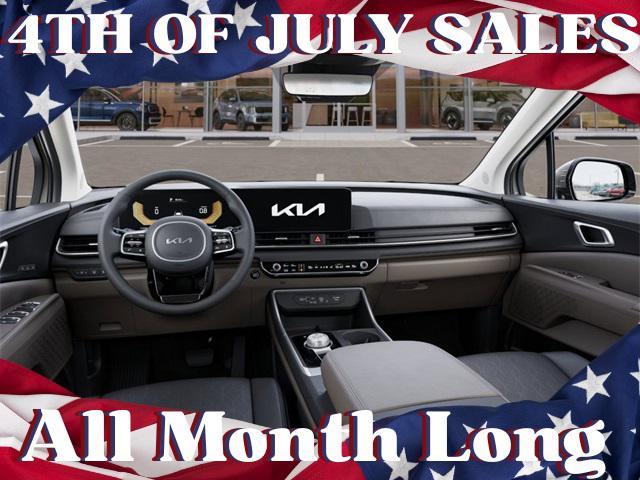 Photo of 2026 Ivory Silver Kia Carnival Hybrid