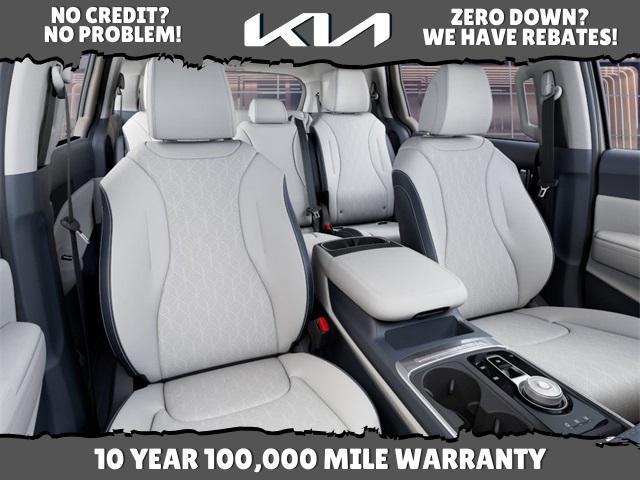 Photo of 2026 Ivory Silver Kia Carnival Hybrid
