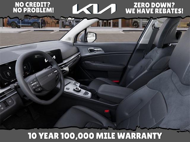 Photo of 2026 Wolf Gray Kia Sportage Hybrid