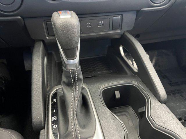 Photo of 2024 Glacier White Nissan Frontier