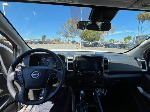 Photo of 2024 Glacier White Nissan Frontier