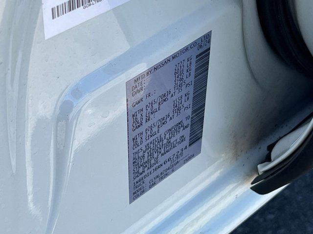 Photo of 2024 Glacier White Nissan Frontier