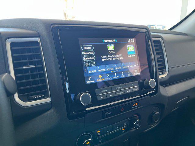 Photo of 2024 Glacier White Nissan Frontier