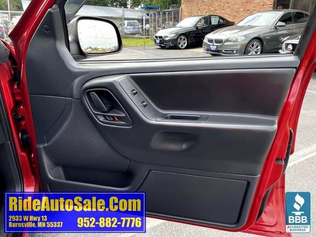 Photo of 2004 Red Jeep Grand Cherokee