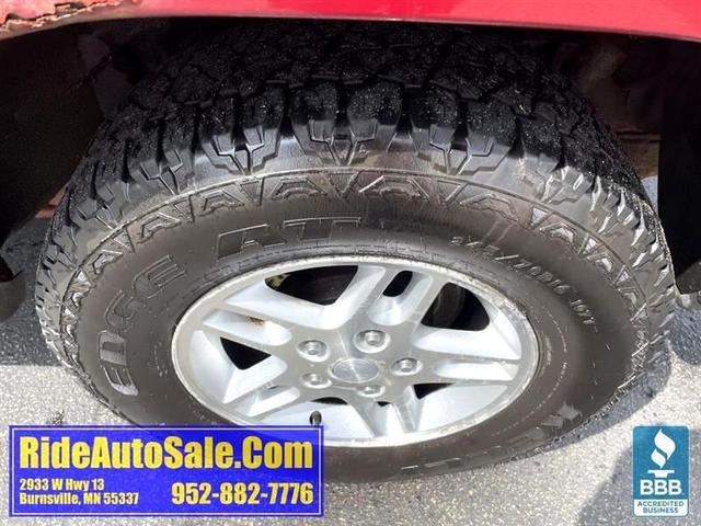 Photo of 2004 Red Jeep Grand Cherokee