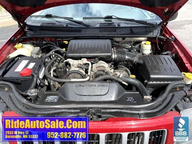 Photo of 2004 Red Jeep Grand Cherokee