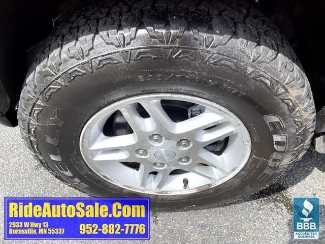 Photo of 2004 Red Jeep Grand Cherokee