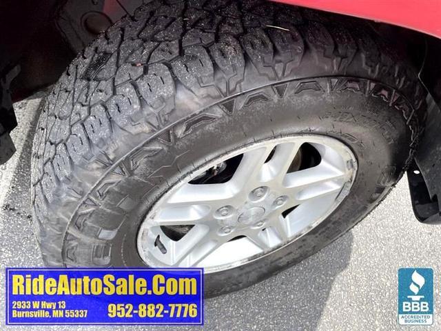 Photo of 2004 Red Jeep Grand Cherokee