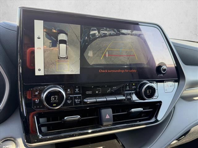 Photo of 2023 Midnight Black Metallic Toyota Highlander Hybrid