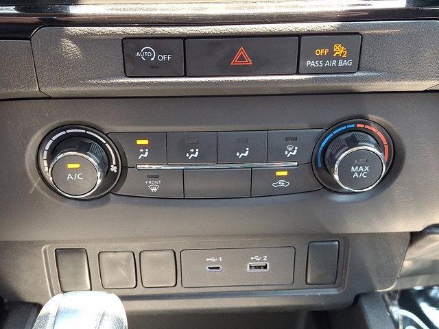 Photo of 2024 Glacier White Nissan Frontier