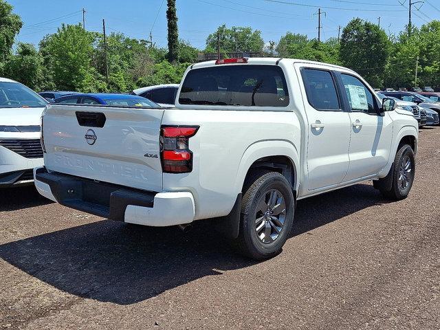 Photo of 2025 Glacier White Nissan Frontier