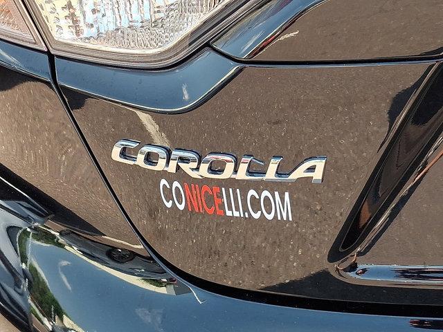 Photo of 2024 Midnight Black Metallic Toyota Corolla