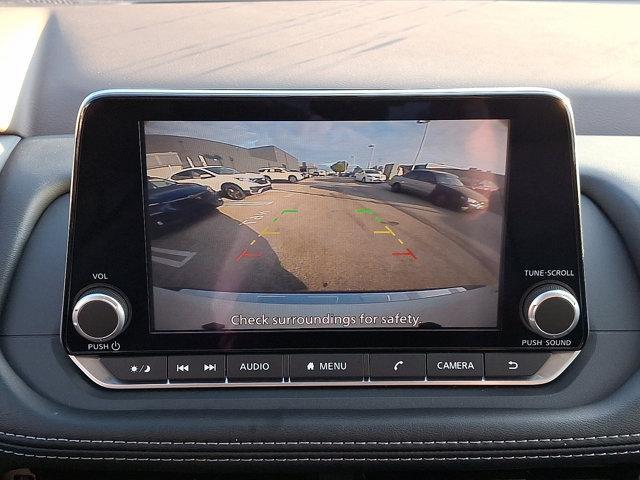 Photo of 2023 Pearl White Tricoat Nissan Rogue