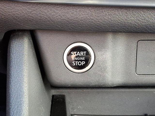 Photo of 2023 Pearl White Tricoat Nissan Rogue