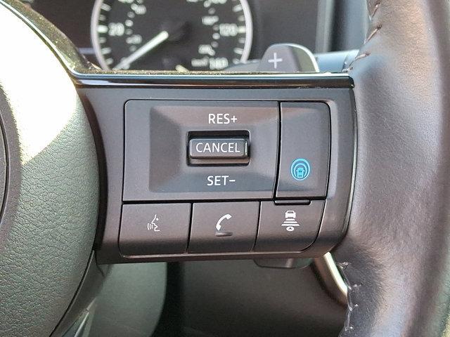 Photo of 2023 Pearl White Tricoat Nissan Rogue
