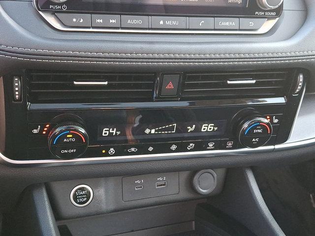 Photo of 2023 Pearl White Tricoat Nissan Rogue