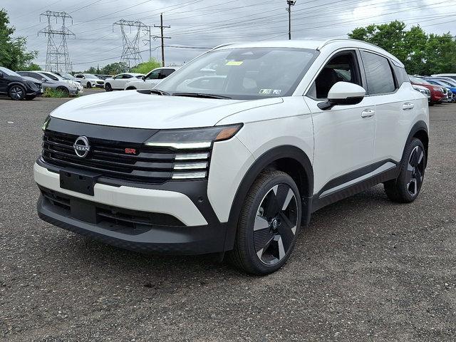 Photo of 2025 Aspen White Tricoat Nissan Kicks