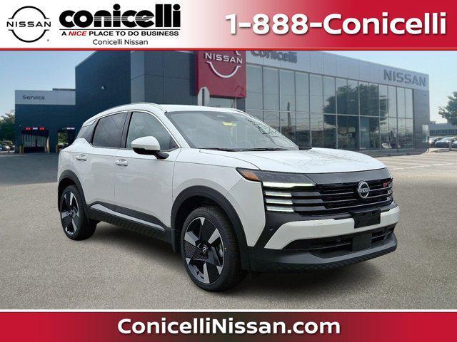 Photo of 2025 Aspen White Tricoat Nissan Kicks