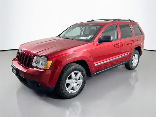 Photo of 2010 Inferno Red Crystal Pearlcoat Jeep Grand Cherokee