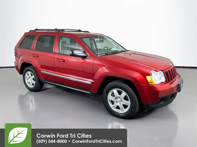 Photo of 2010 Inferno Red Crystal Pearlcoat Jeep Grand Cherokee