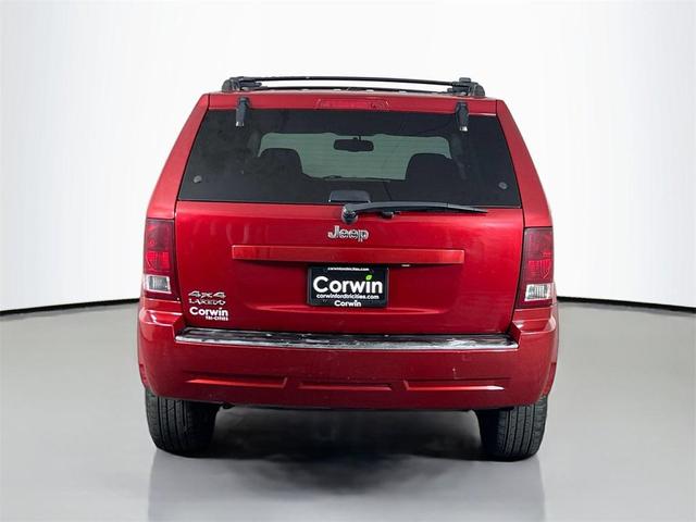 Photo of 2010 Inferno Red Crystal Pearlcoat Jeep Grand Cherokee