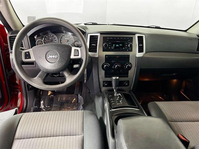 Photo of 2010 Inferno Red Crystal Pearlcoat Jeep Grand Cherokee