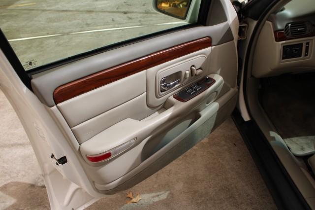 Photo of 1999 Cotillion White Cadillac DeVille
