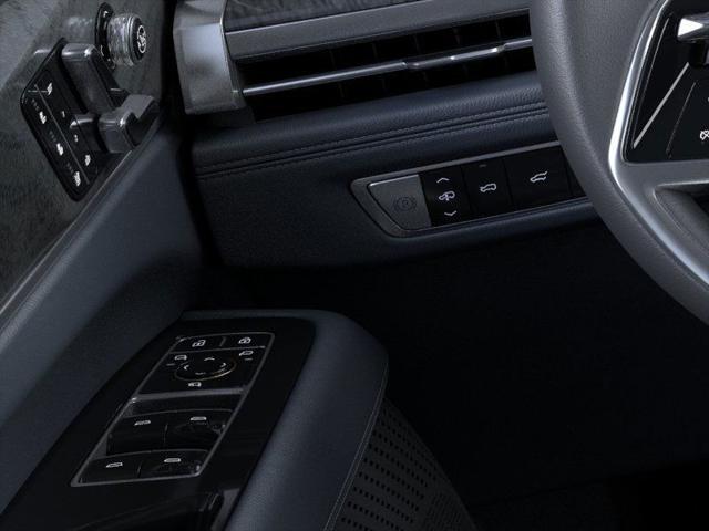 Photo of 2025 Black Raven Cadillac Escalade IQ