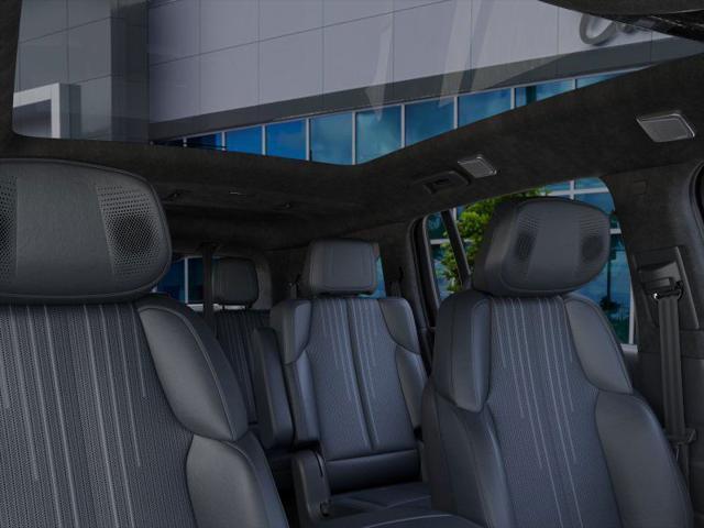 Photo of 2025 Black Raven Cadillac Escalade IQ